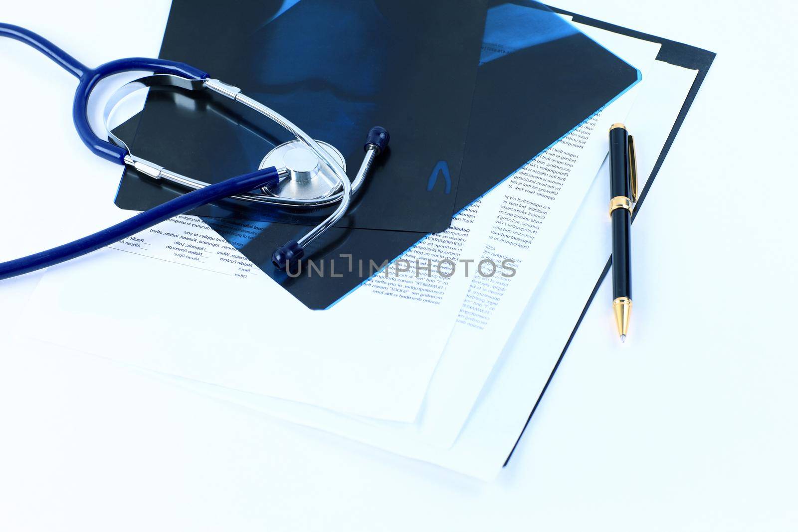 Medical documents of fluorography with pen and stethoscope on the table