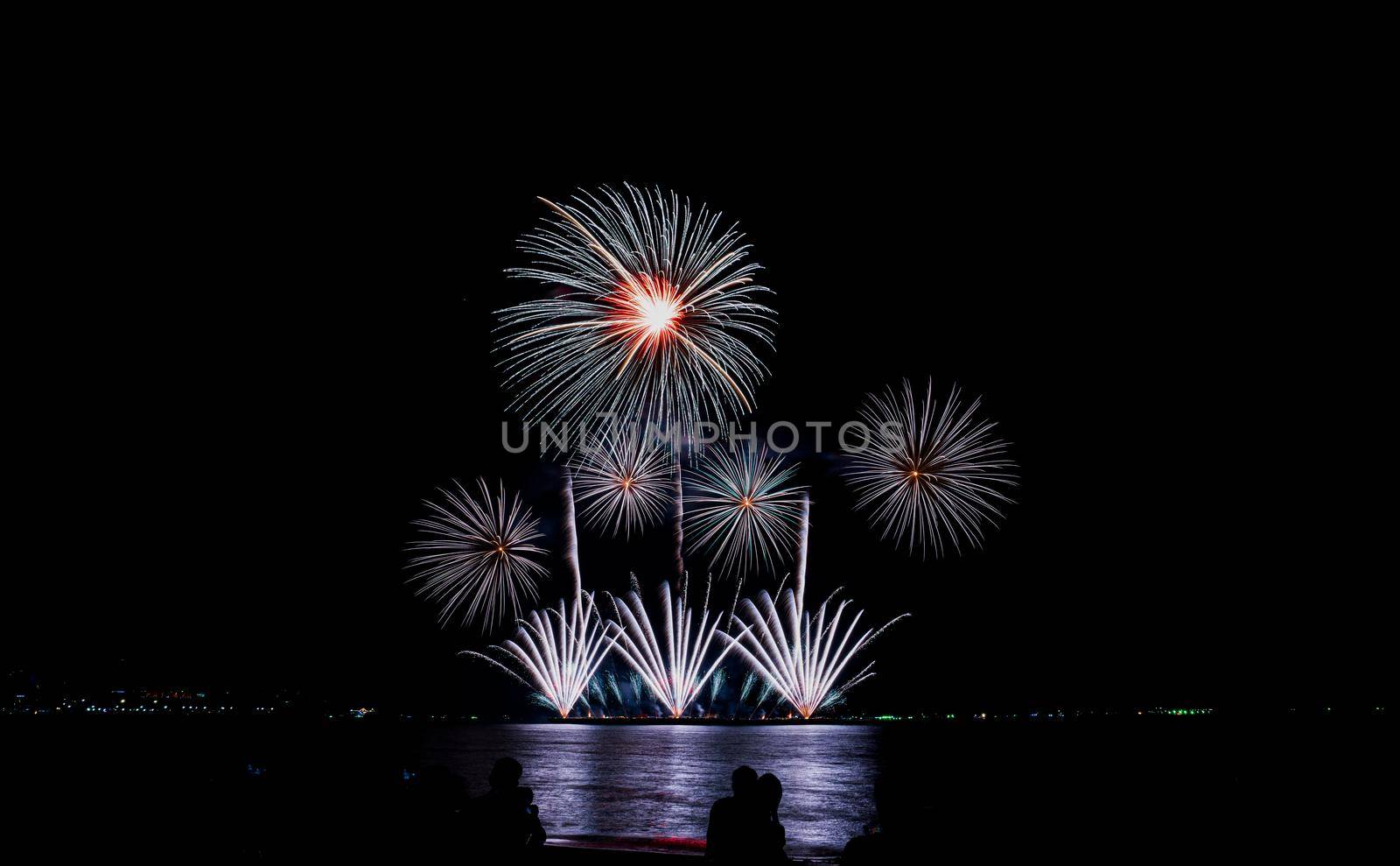 Fireworks at the sea in night time for celebration of new years