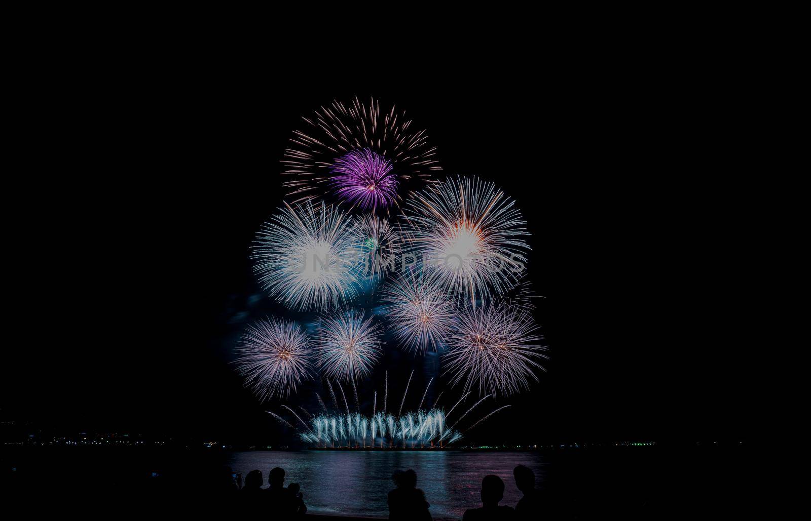 Fireworks at the sea in night time for celebration of new years