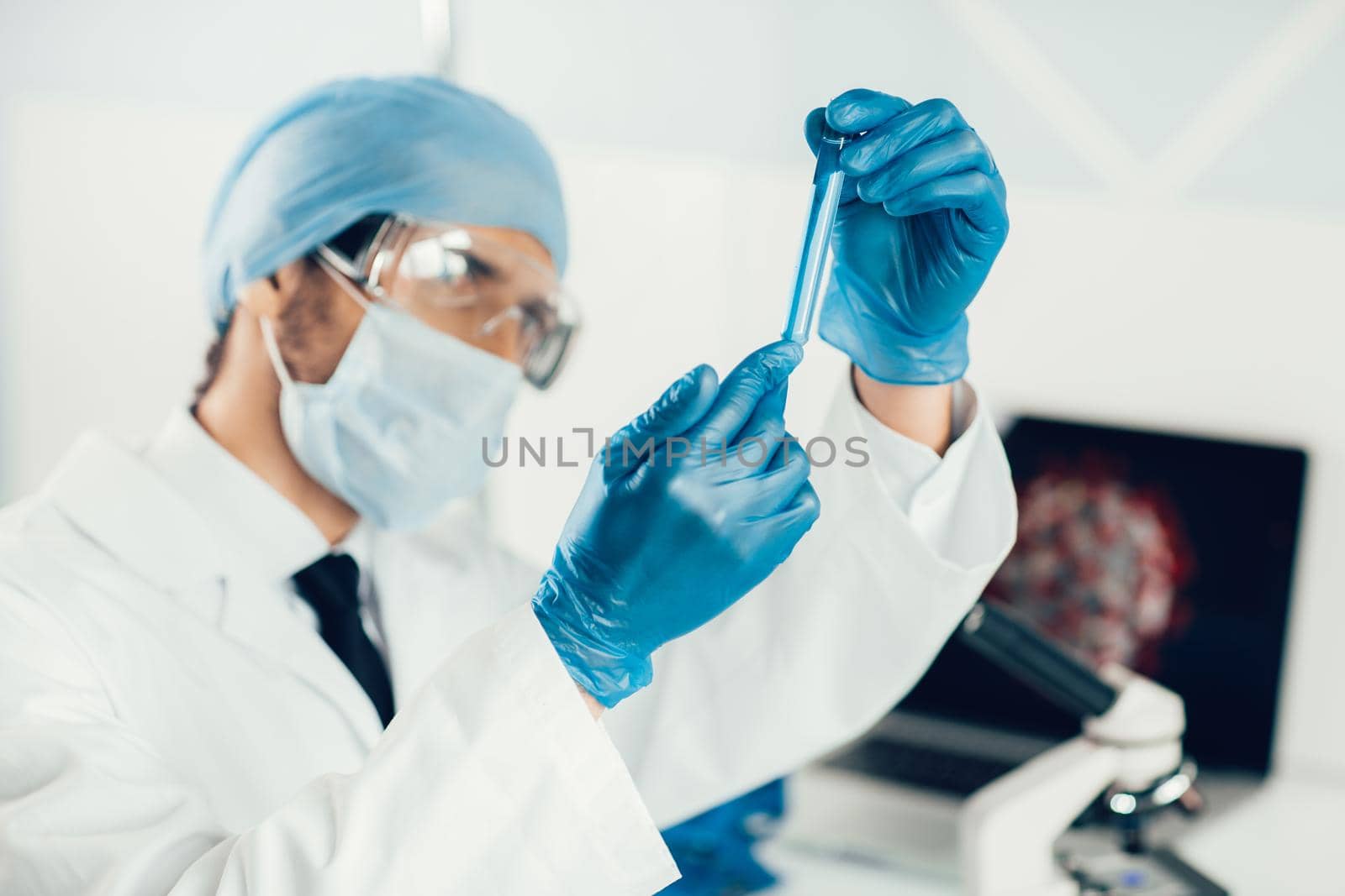 close up. sample of the vaccine in the hands of a scientist . photo with a copy-space.