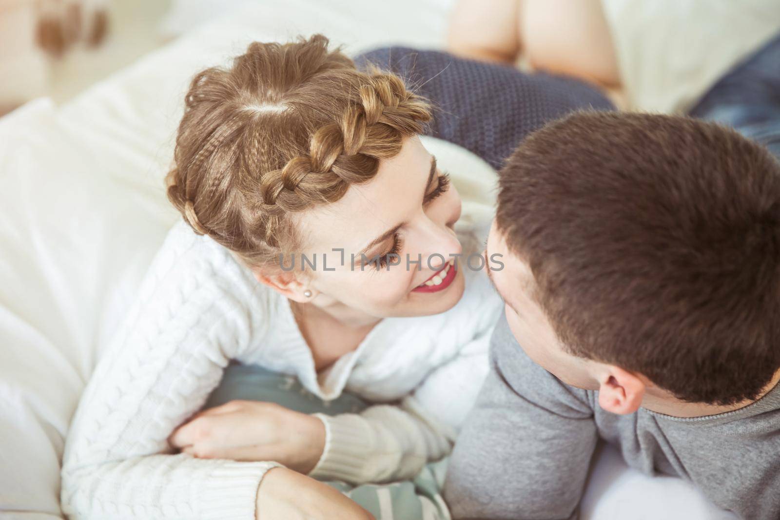 close-up of a happy loving couple on the couch in the living room