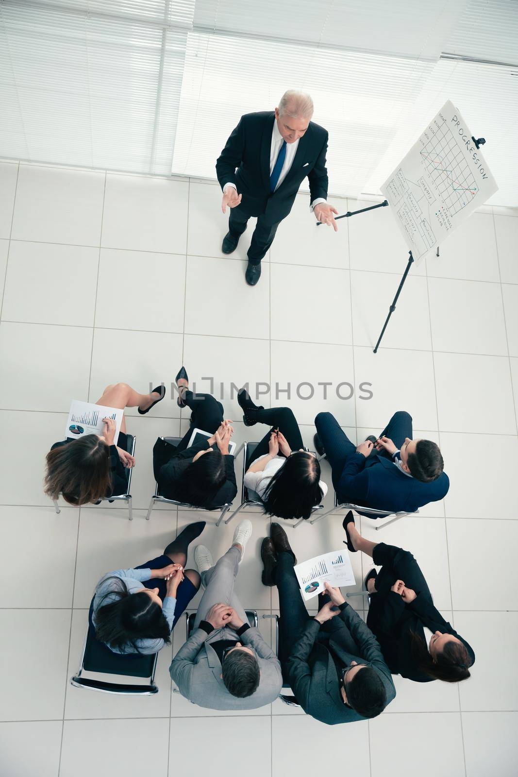 group of business people at a presentation in the conference room by SmartPhotoLab