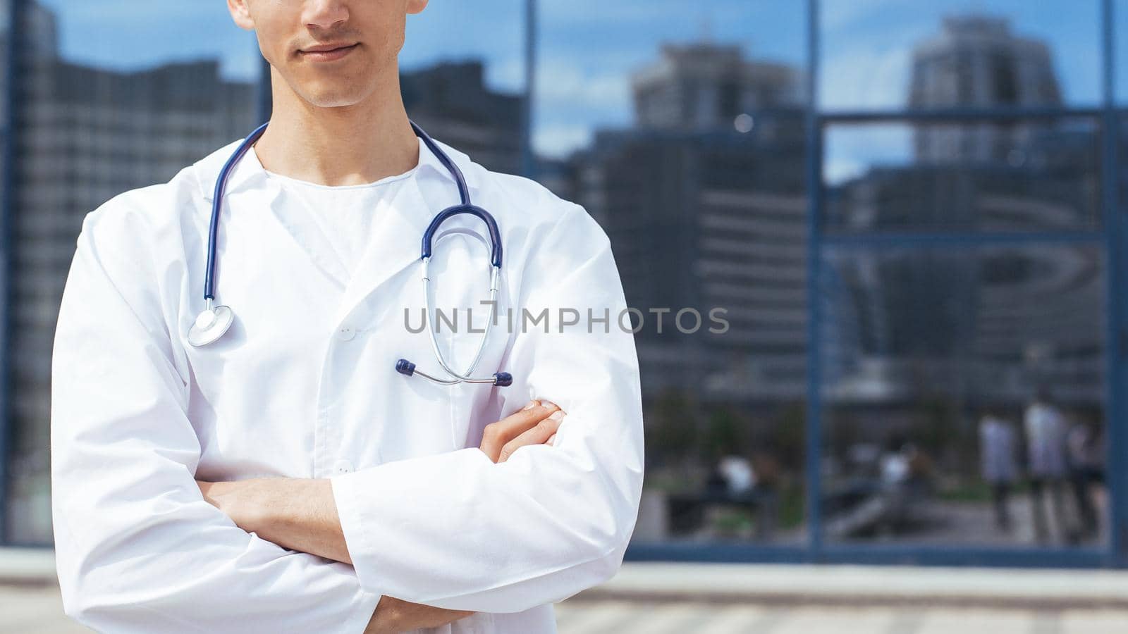 close up. ambulance doctor standing on a city street. photo with a copy-space.