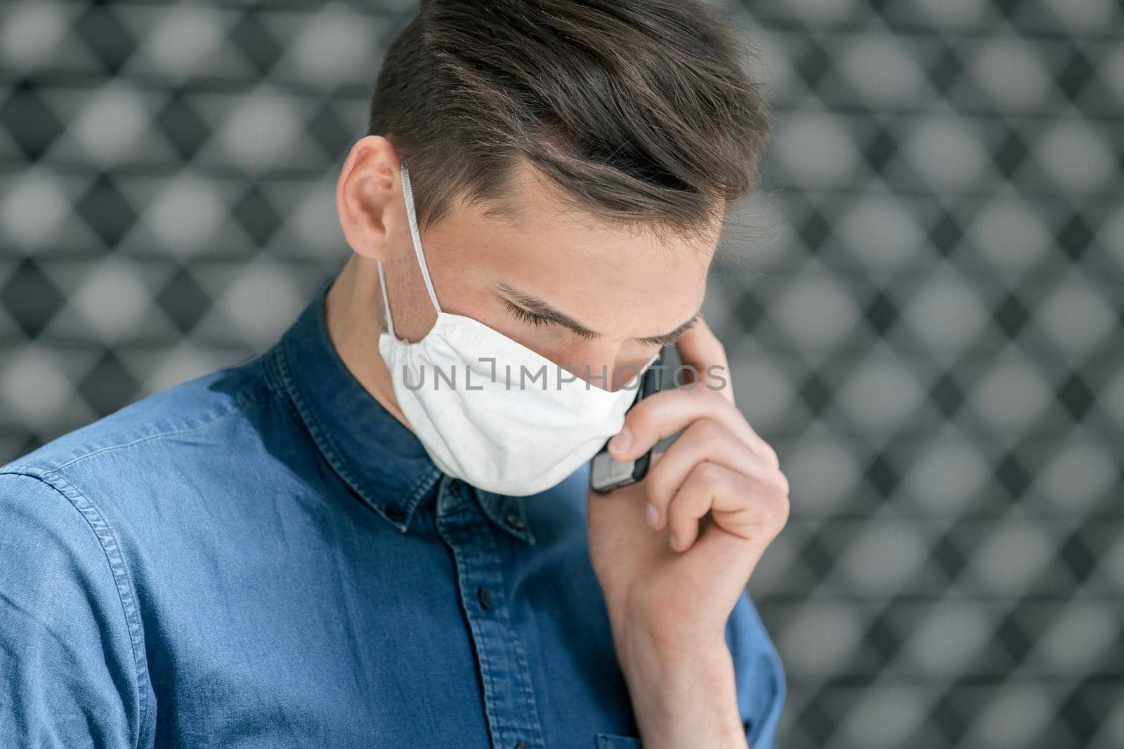 close up. a young man in a protective mask looking at the camera. photo with a copy-space