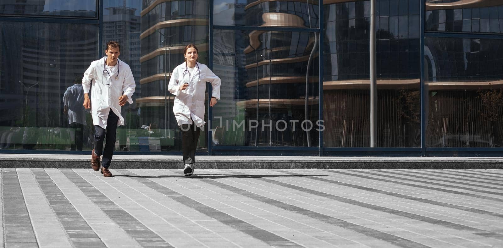 in full growth. medical professionals running to the rescue. by SmartPhotoLab