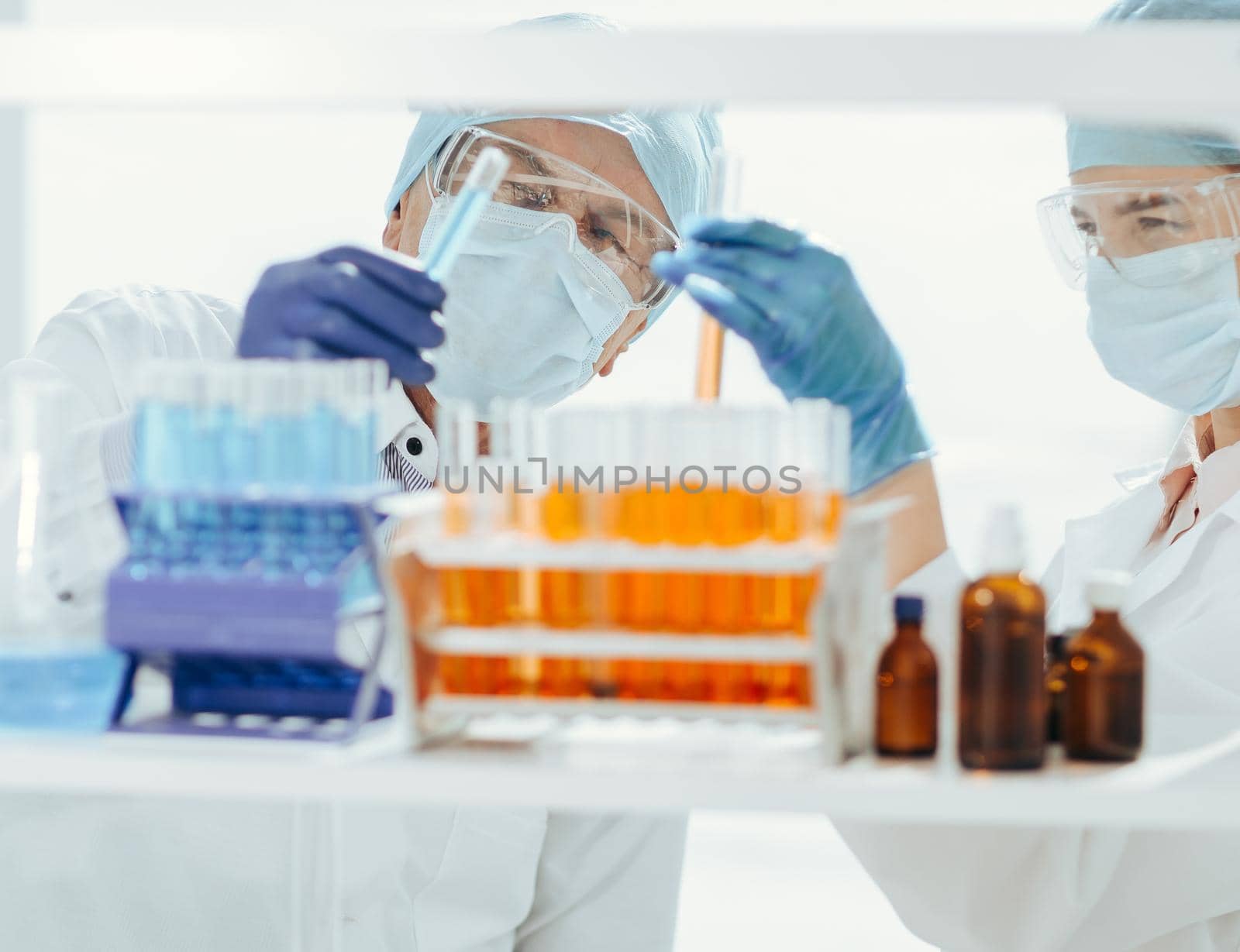 close up. laboratory scientists testing blood in the laboratory . photo with a copy-space.