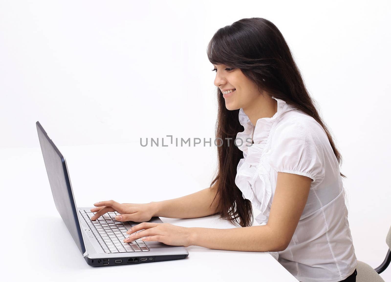 young woman typing text on laptop keyboard.isolated on white background
