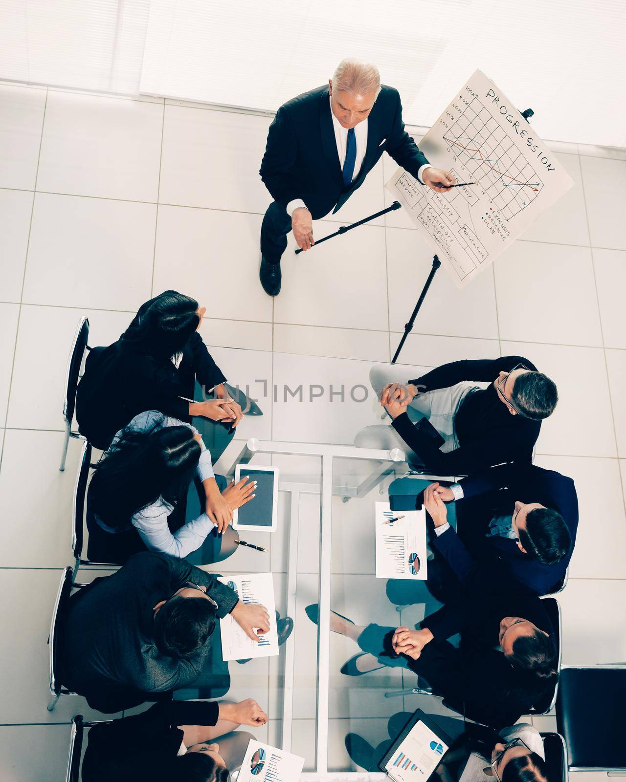 top view. boss at a meeting with the business team by SmartPhotoLab