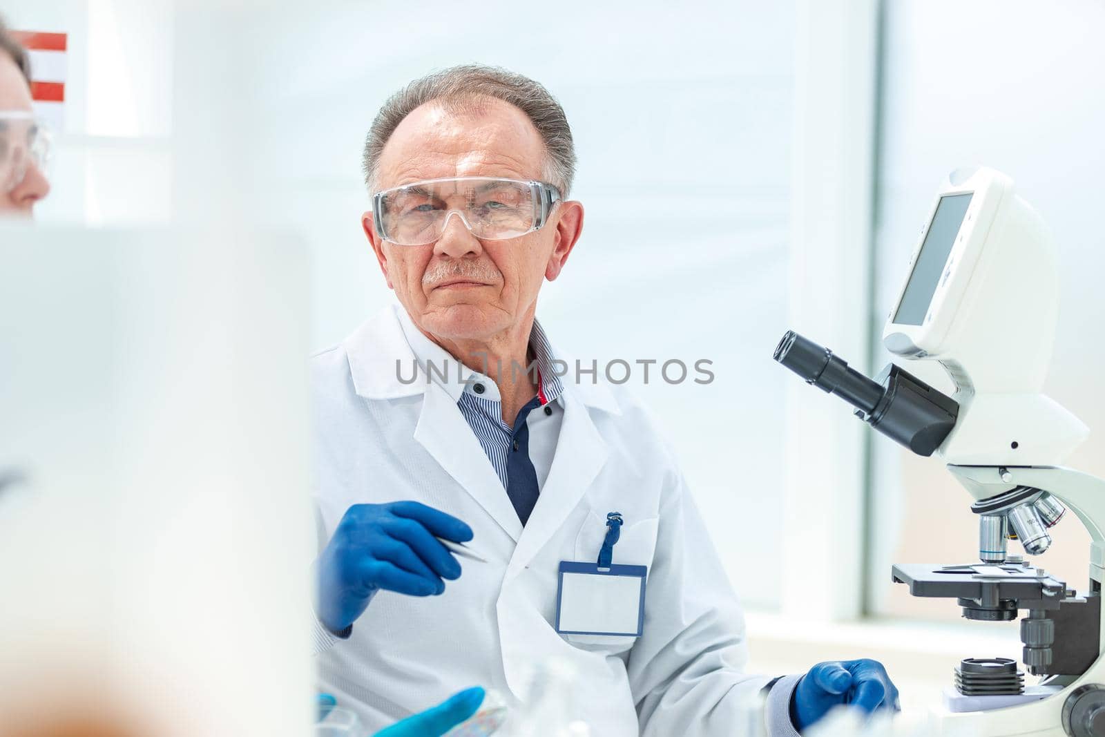 close up. scientists are working on creating a new vaccine. by SmartPhotoLab