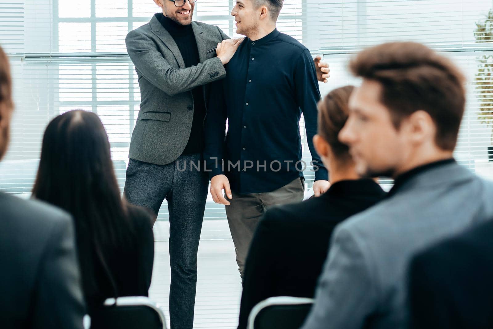 project Manager introducing a new employee .photo with a copy of the space