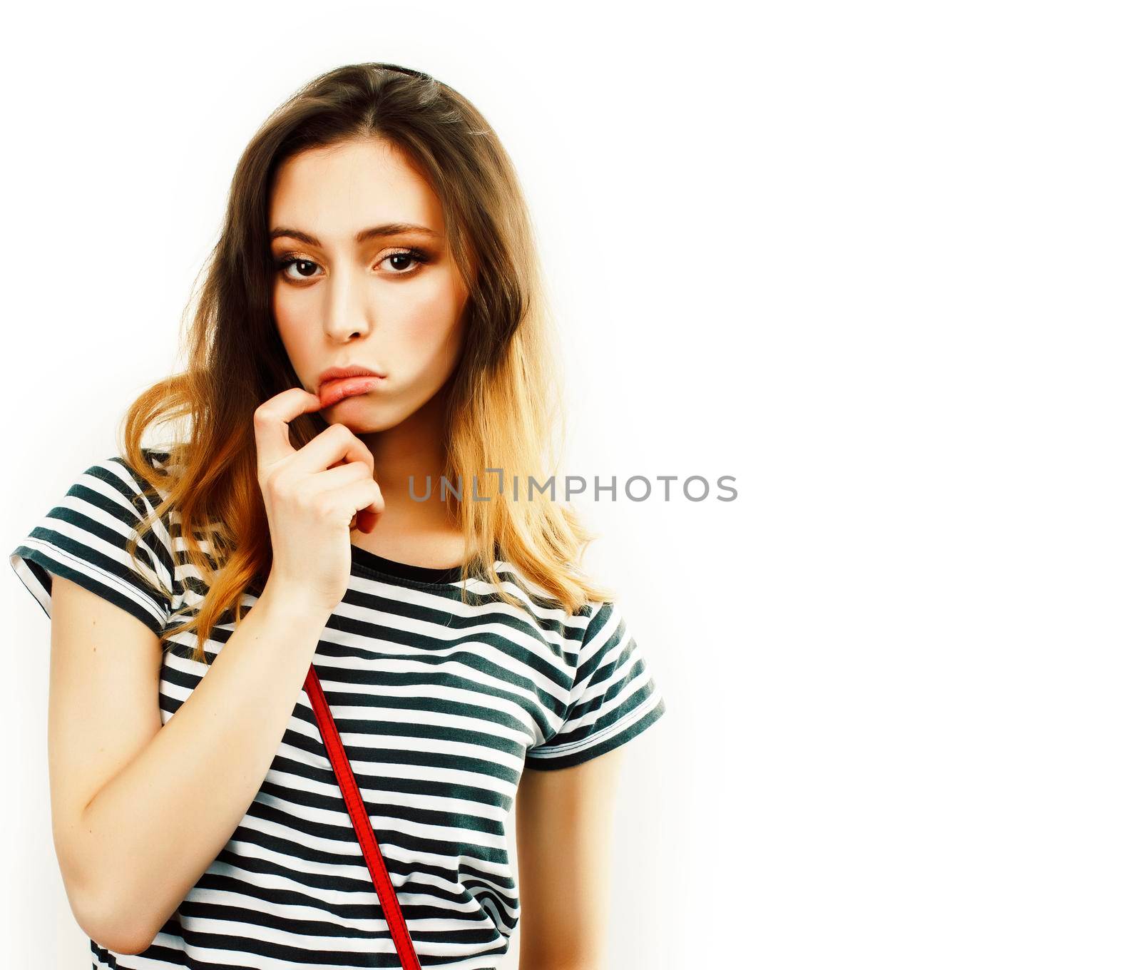 young pretty teenage hipster girl posing emotional happy smiling on white background, lifestyle people concept by JordanJ