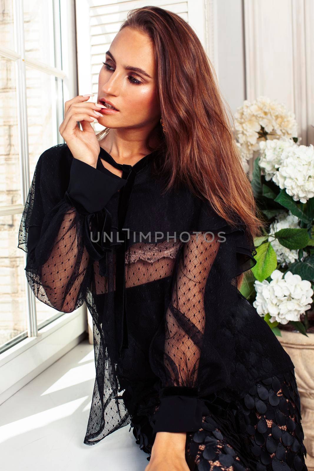 young pretty lady in black lace fashion style dress posing in rich interior of royal hotel room, luxury lifestyle people concept by JordanJ
