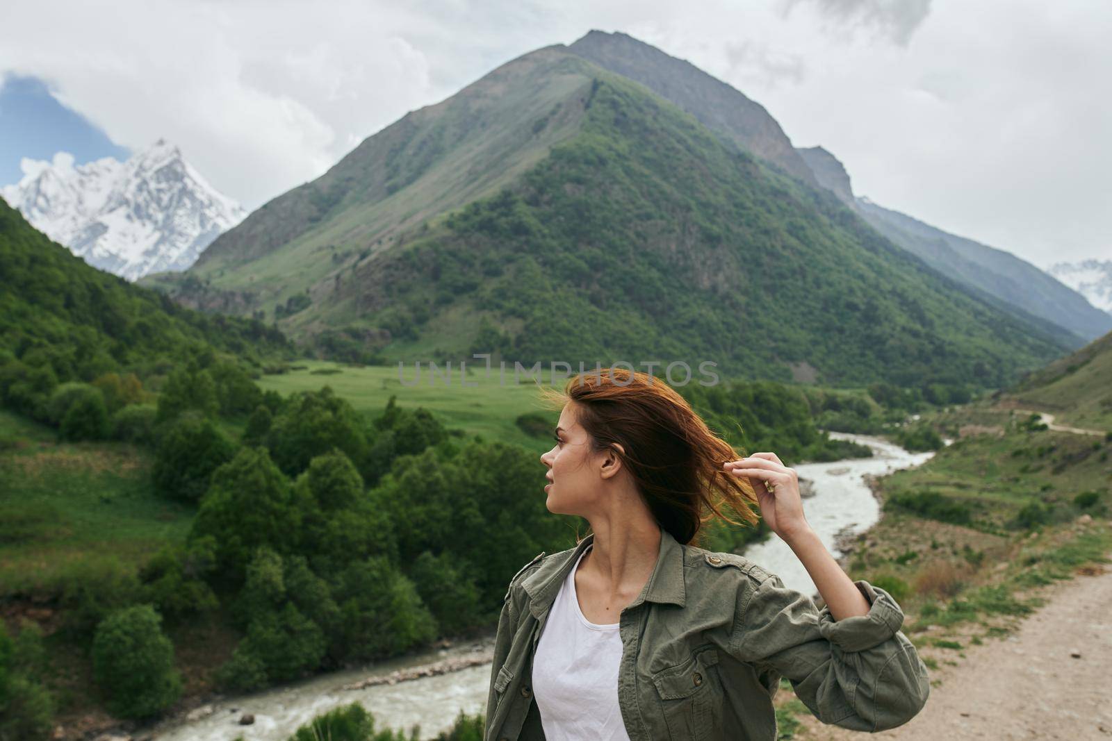 woman hiker mountains landscape travel freedom fresh air by Vichizh