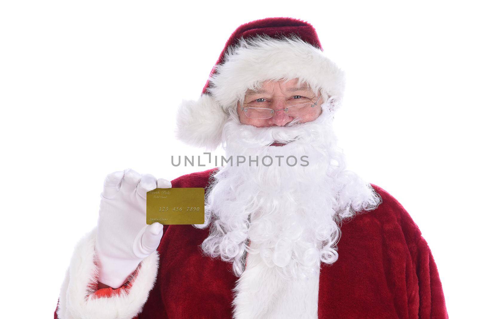 Santa Claus holding his personal Noth Pole Gold Credit Card, isolated on white. by sCukrov