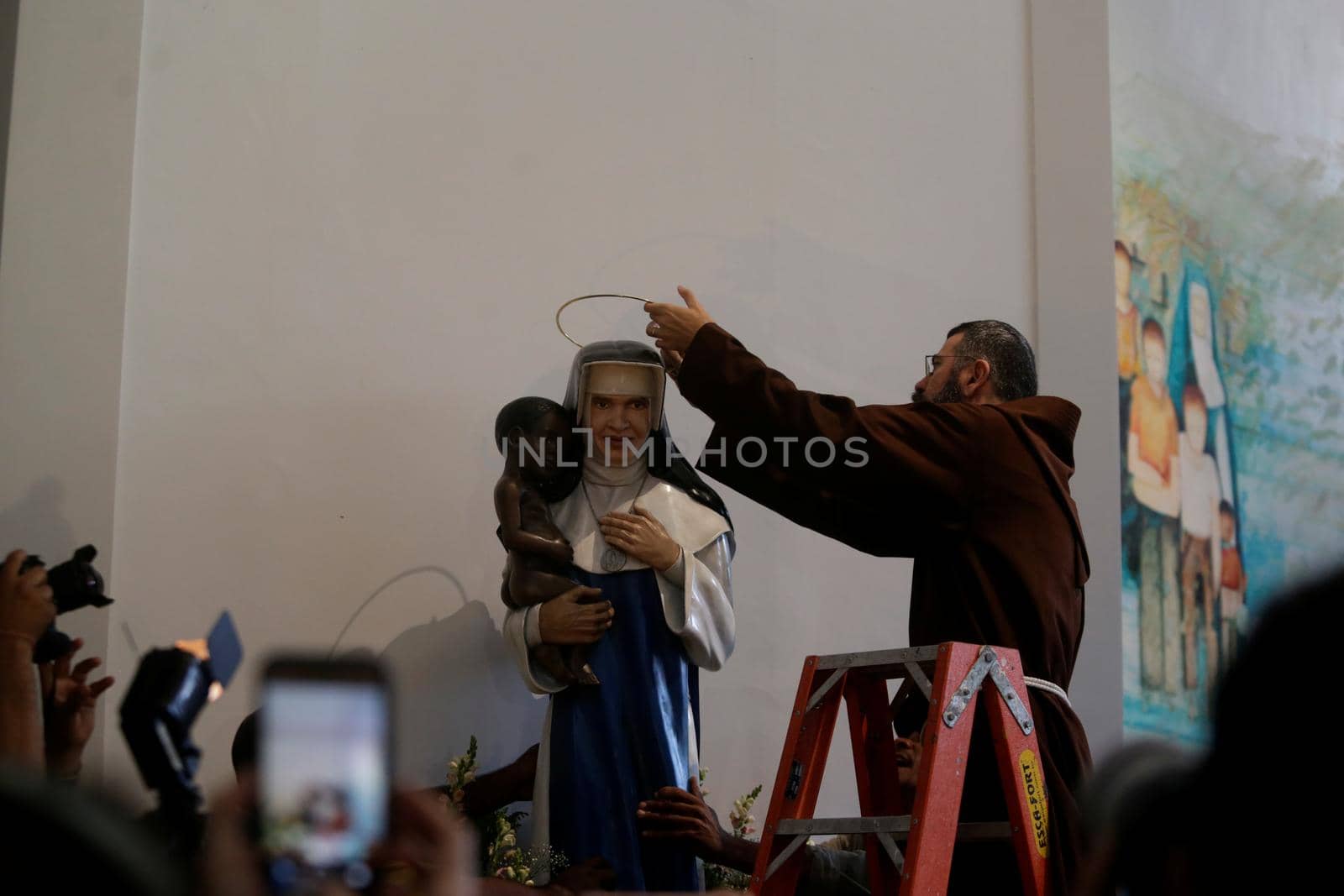 salvador, bahia, brazil - october 13, 2019: return of the nun Santa Dulce dos Pobres seen with the sculpture of the saint in the sanctuary in the city of Salvador.