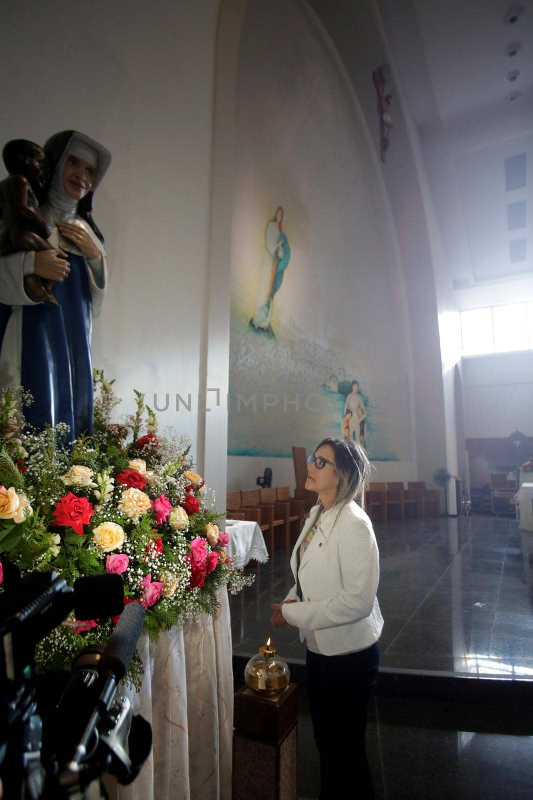 salvador, bahia, brazil - october 13, 2019: return of the nun Santa Dulce dos Pobres seen with the sculpture of the saint in the sanctuary in the city of Salvador.