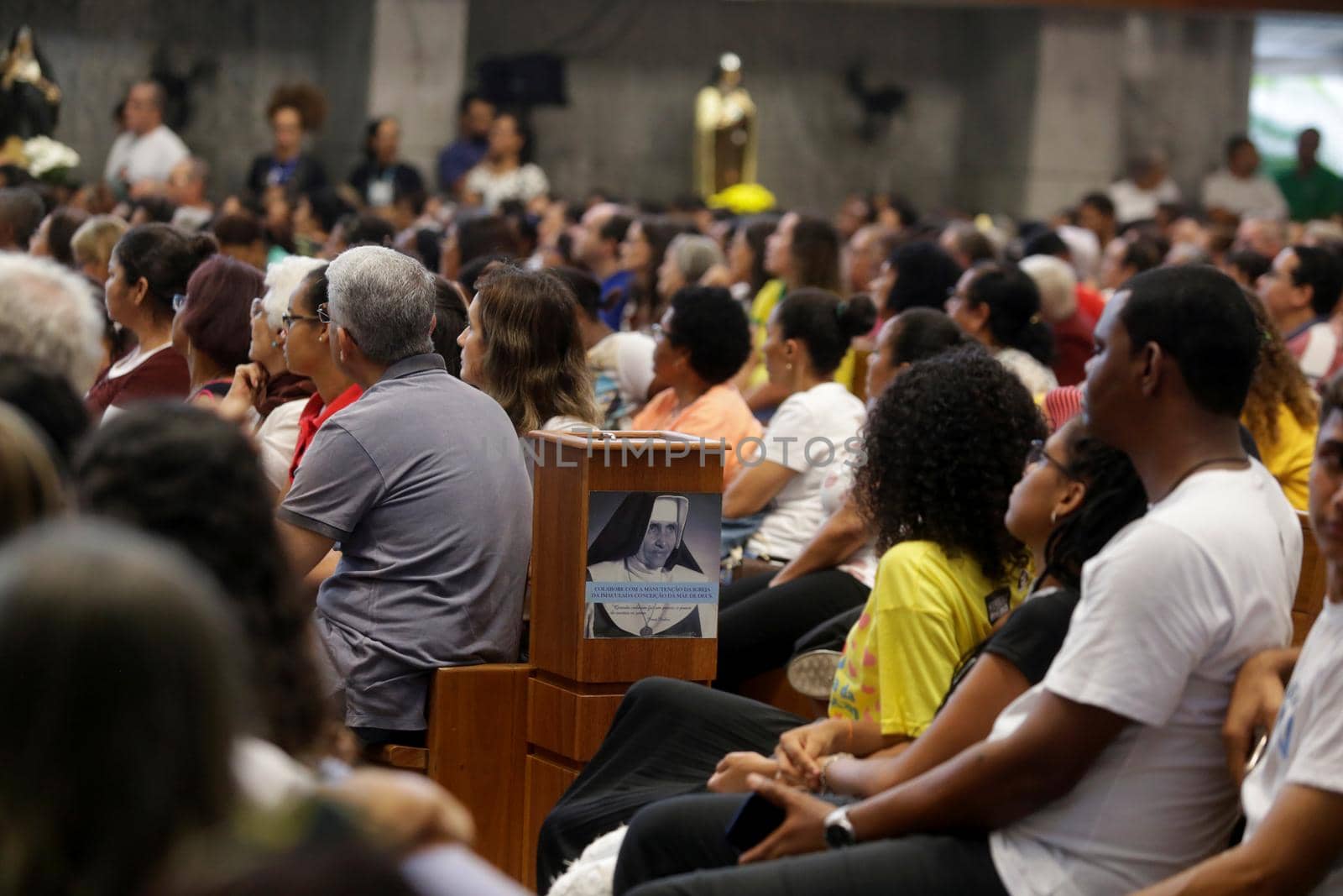 salvador, bahia, brazil - october 13, 2019: Devotees of Santa Dulce of the Poor are seen during mass at the Santa Sanctuary in the city of Salvador.