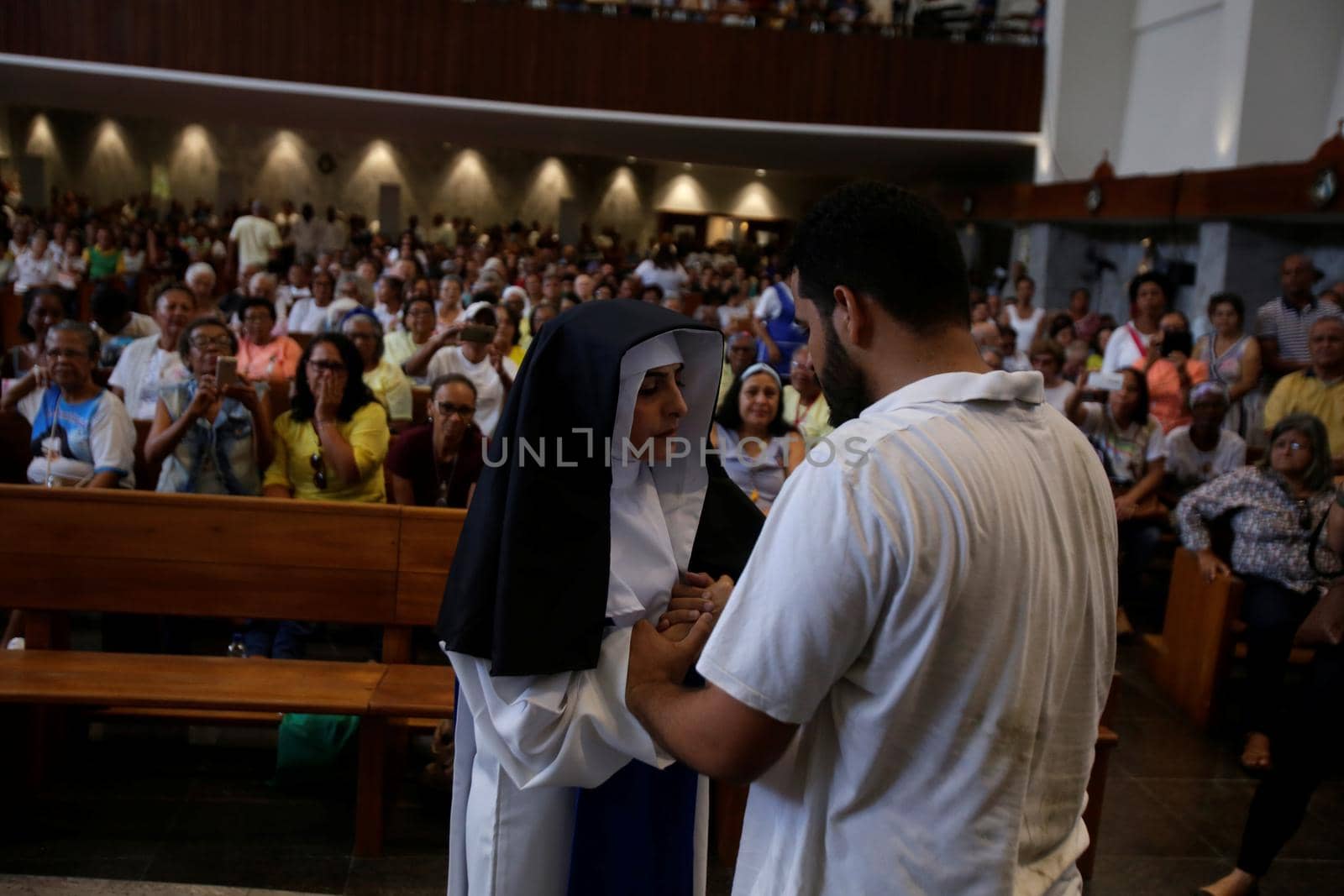 salvador, bahia, brazil - october 13, 2019: woman wears the clothes of a Santa Dulce dos Pobres nun during a theatrical presentation at the sanctuary of the saint in Salvador