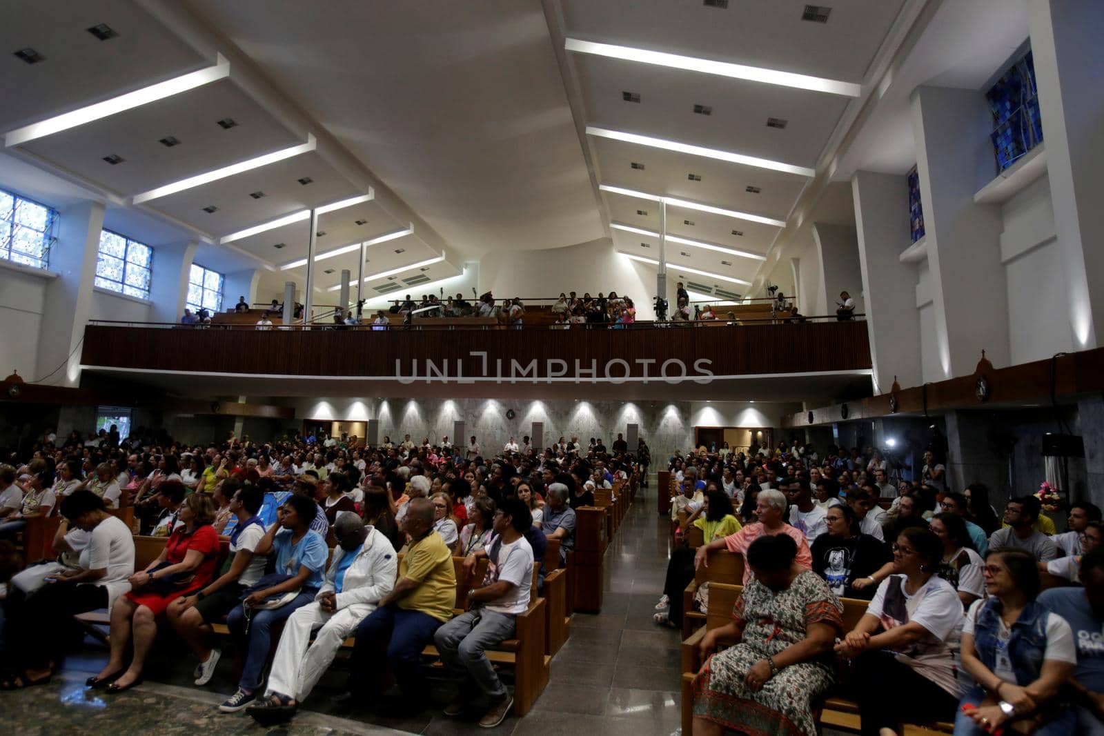 salvador, bahia, brazil - october 13, 2019: Devotees of Santa Dulce of the Poor are seen during mass at the Santa Sanctuary in the city of Salvador.