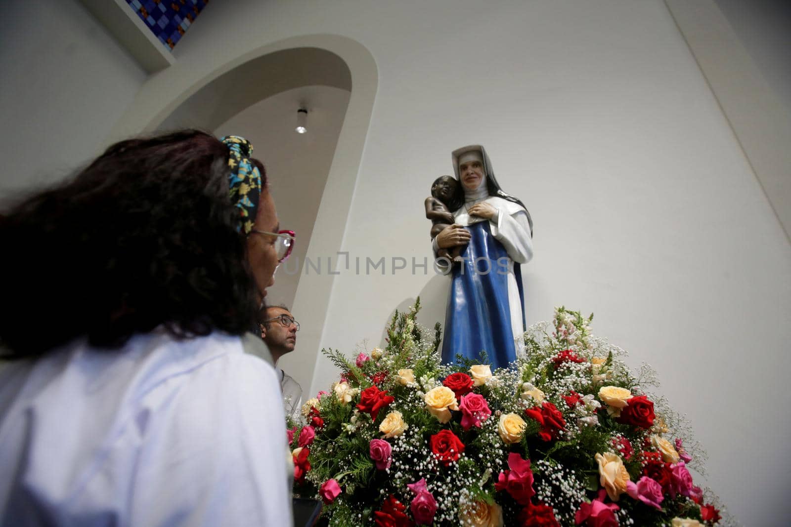 salvador, bahia, brazil - october 13, 2019: return of the nun Santa Dulce dos Pobres seen with the sculpture of the saint in the sanctuary in the city of Salvador.