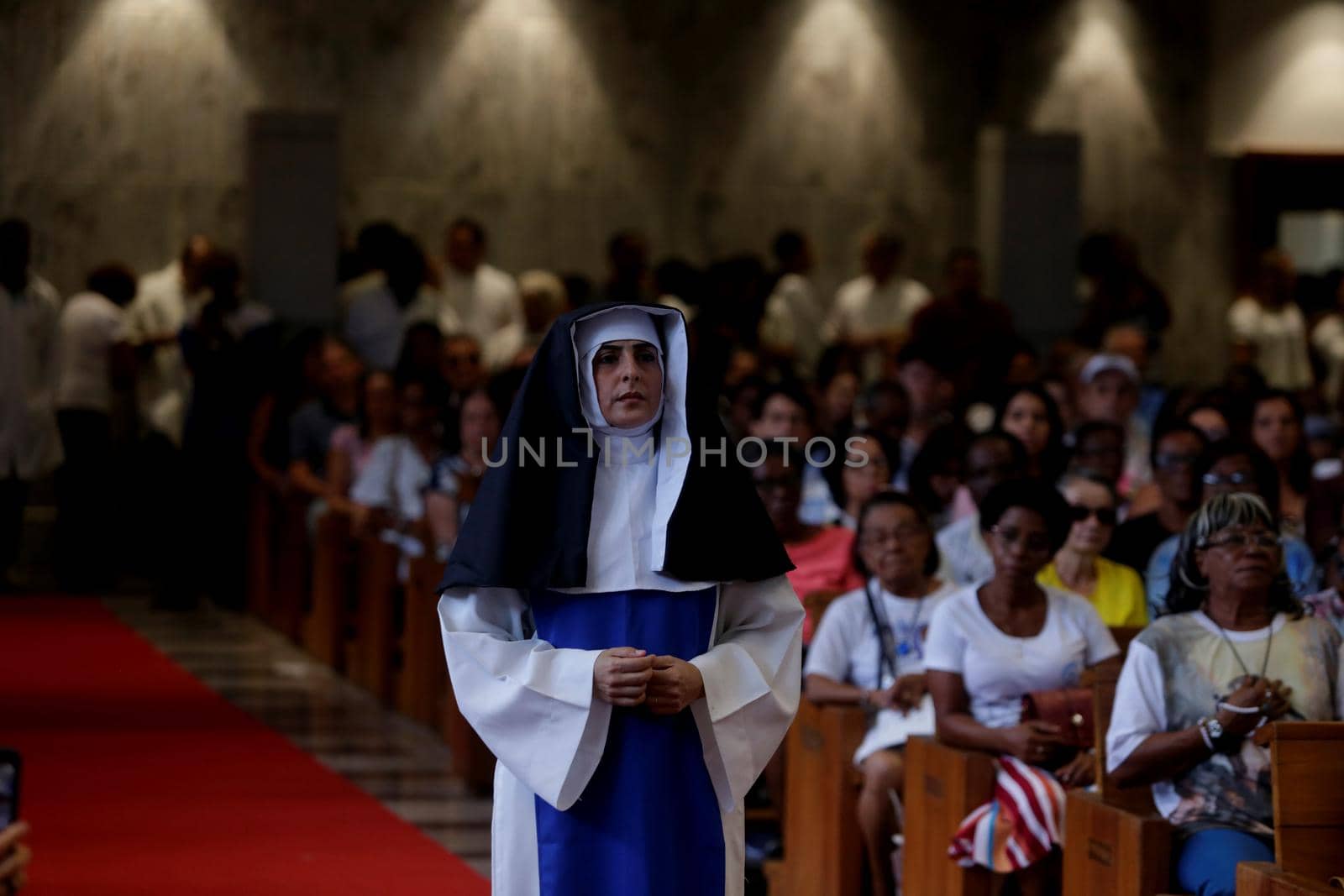salvador, bahia, brazil - october 13, 2019: woman wears the clothes of a Santa Dulce dos Pobres nun during a theatrical presentation at the sanctuary of the saint in Salvador