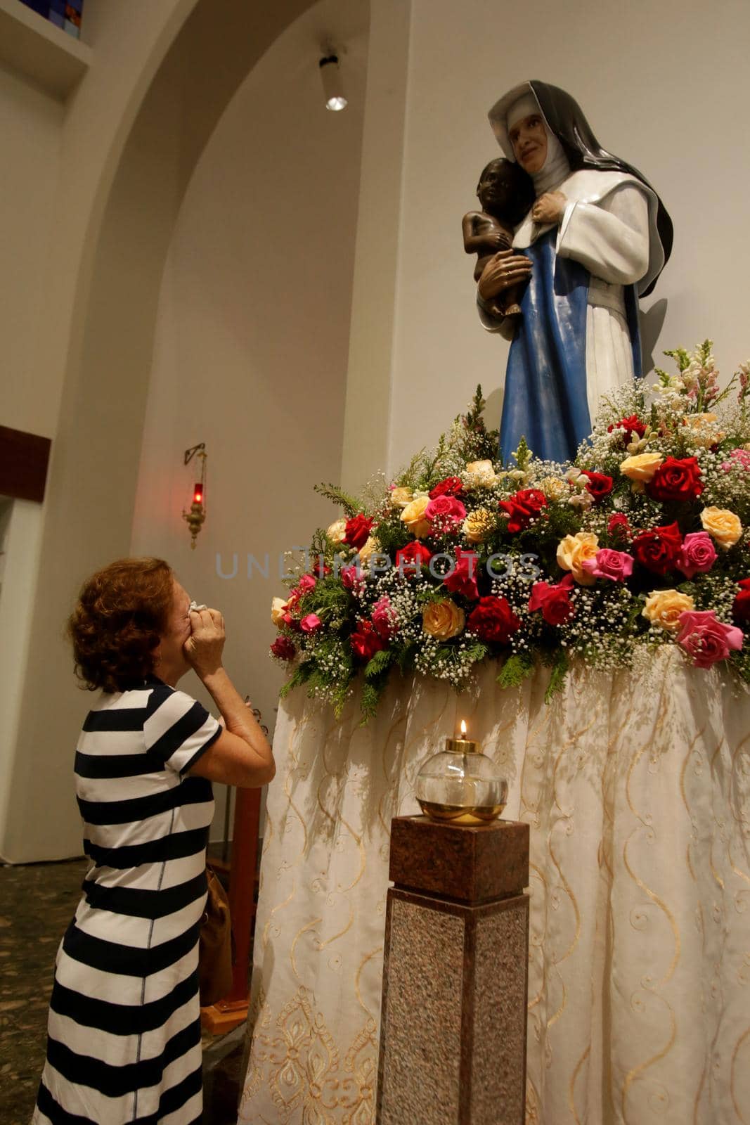 salvador, bahia, brazil - october 13, 2019: return of the nun Santa Dulce dos Pobres seen with the sculpture of the saint in the sanctuary in the city of Salvador.