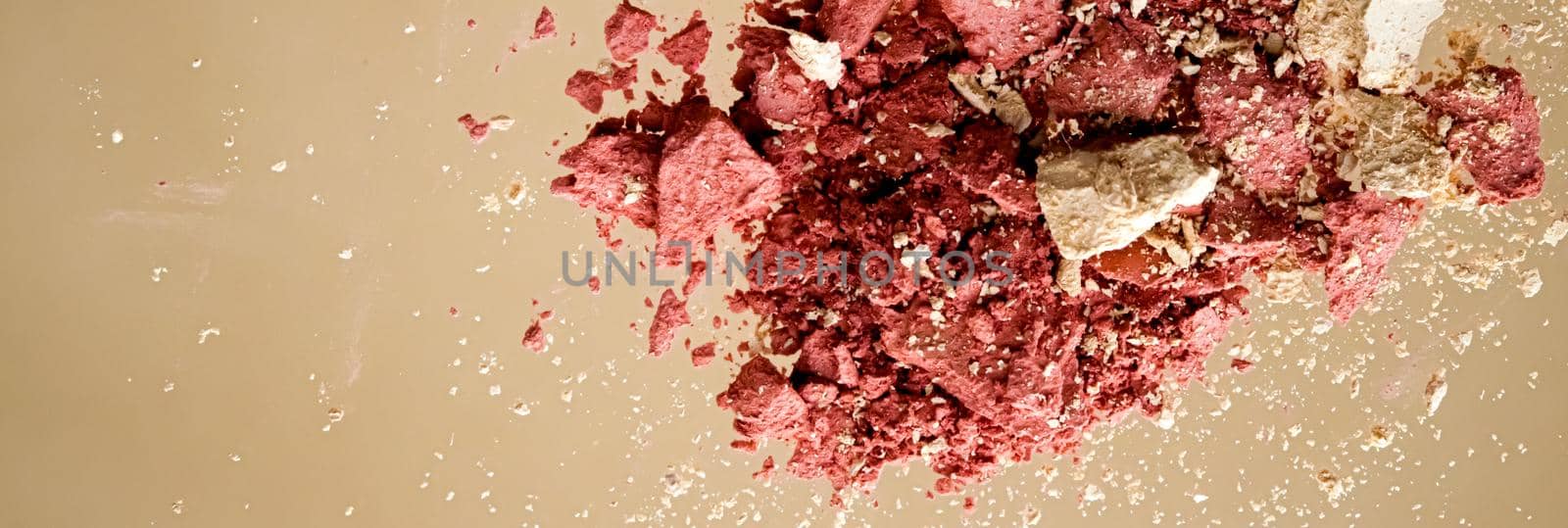 Crushed cosmetics, mineral organic eyeshadow, blush and cosmetic powder isolated on golden background, makeup and beauty banner, flatlay design.