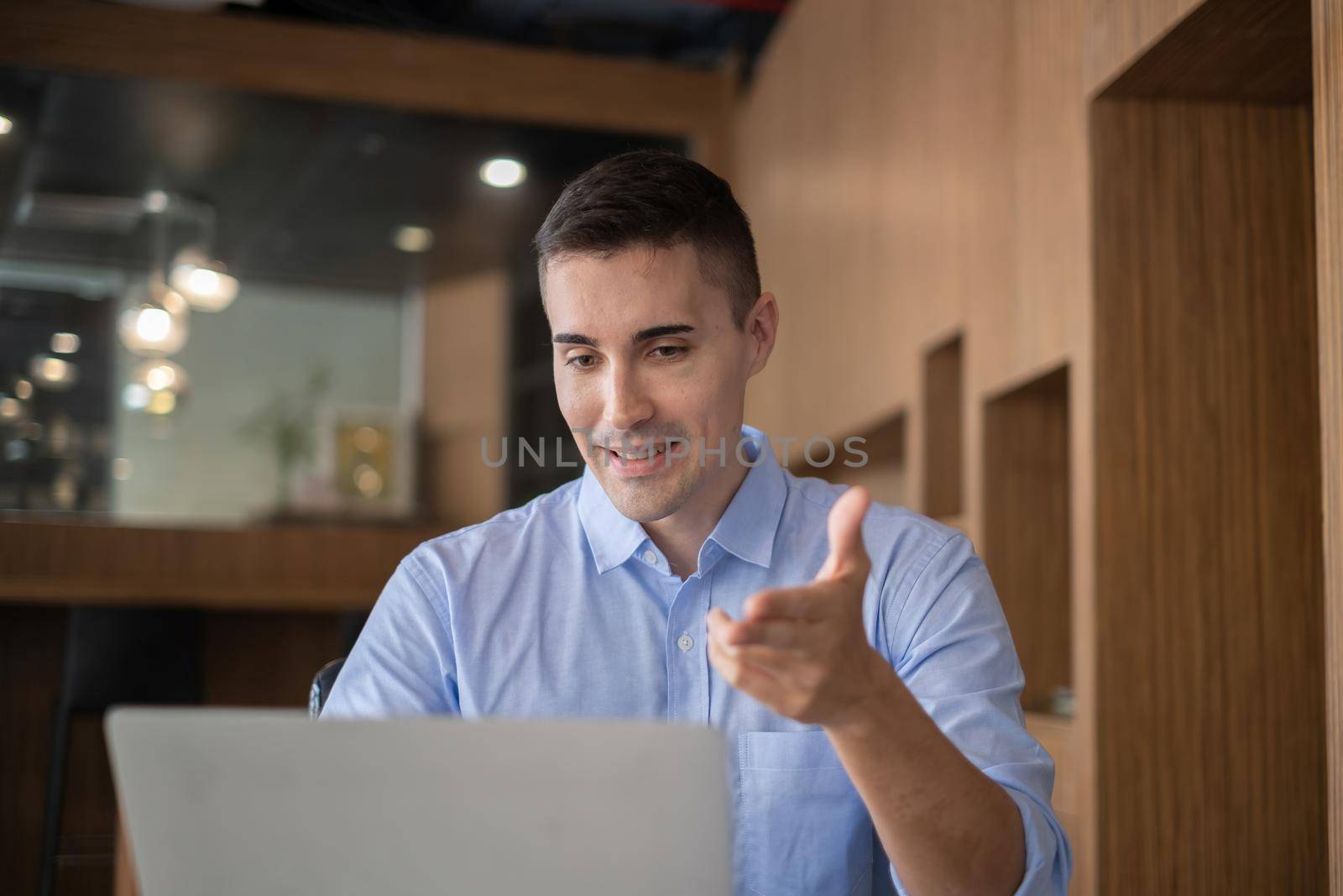 Online video conference and Digital meeting. Businessman discussing business with team by video conference in home office