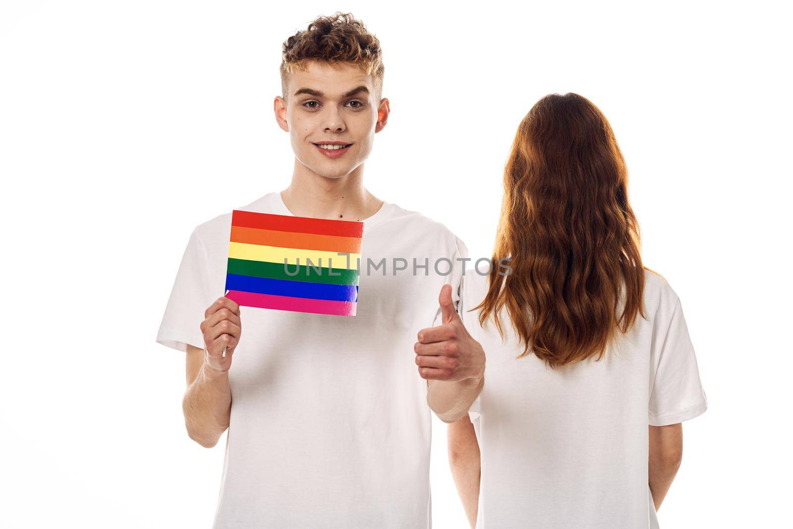 young couple lgbt Flag transgender lifestyle light background by Vichizh