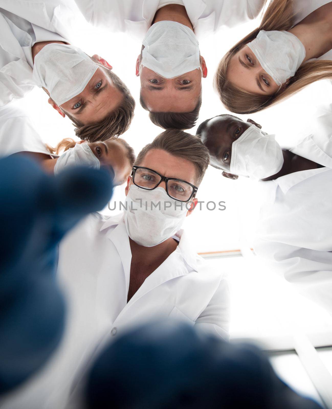 Anesthetists and surgeons working at the operation room by asdf