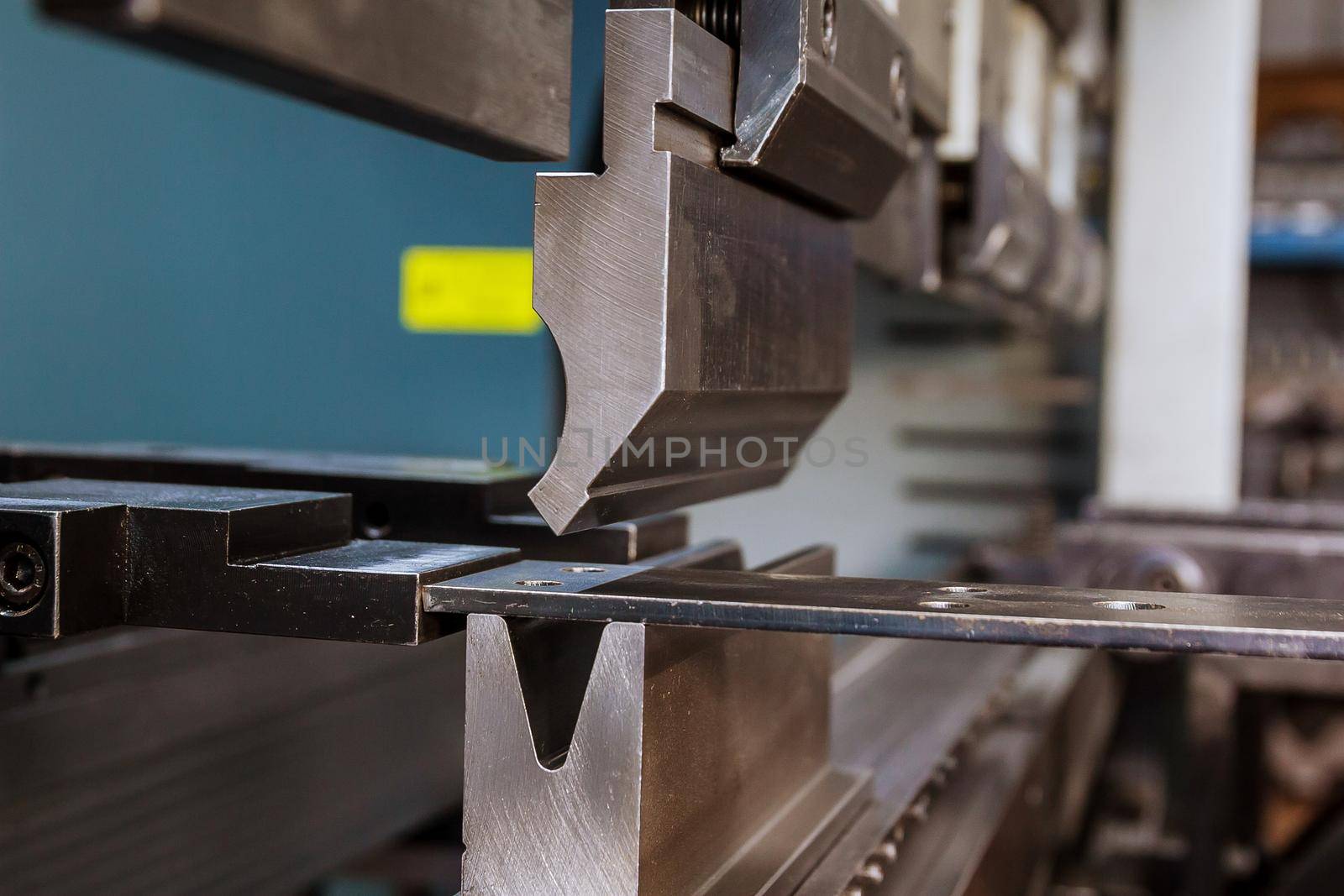 Modern hydraulic metal bending machine in a metallurgical factory