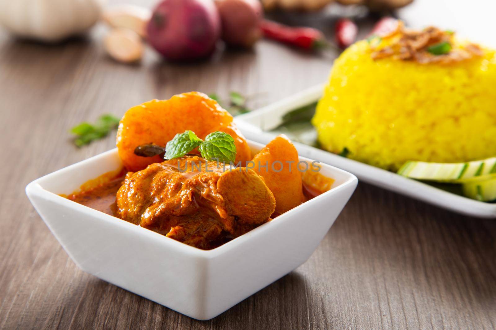 Turmeric Glutinous Rice also known as Nasi Kunyit. Normally eaten with dry curry chicken.