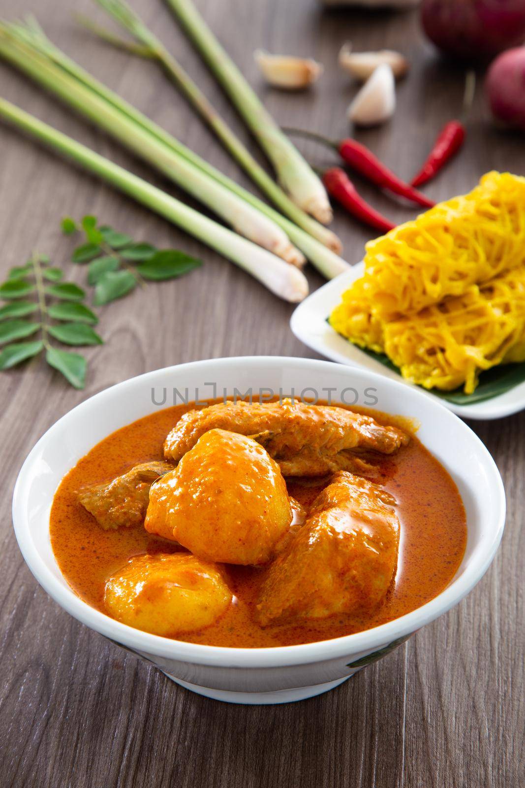 Roti Jala or lace pancake is Malaysian traditional food, a popular Malay snack served with curry dishes