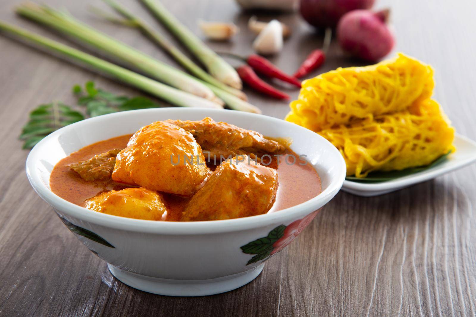 Roti Jala or lace pancake is Malaysian traditional food, a popular Malay snack served with curry dishes