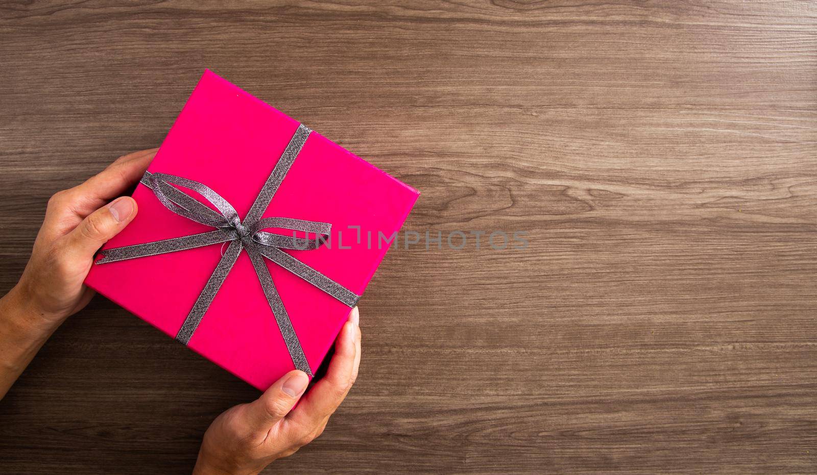 Christmas composition. Christmas gifts, decorations on wooden background. Flat lay, top view. Copy space
