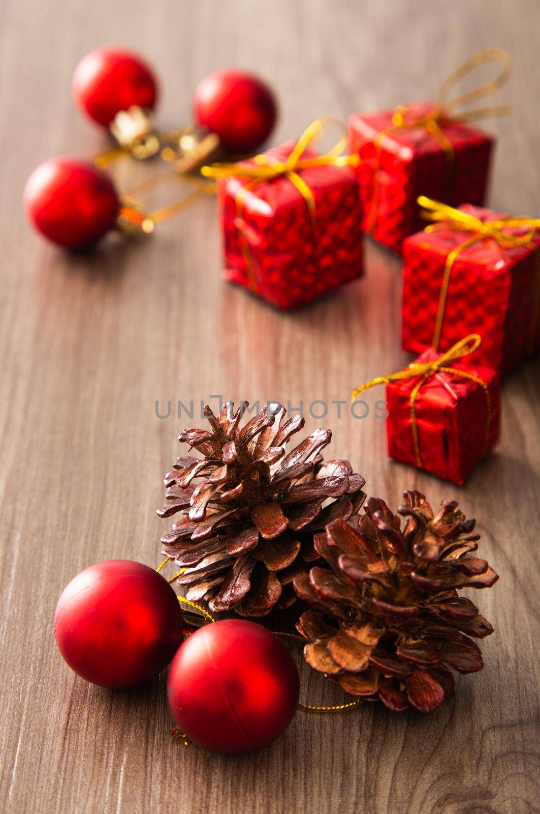 Christmas composition. Christmas gifts, decorations on wooden background. by tehcheesiong