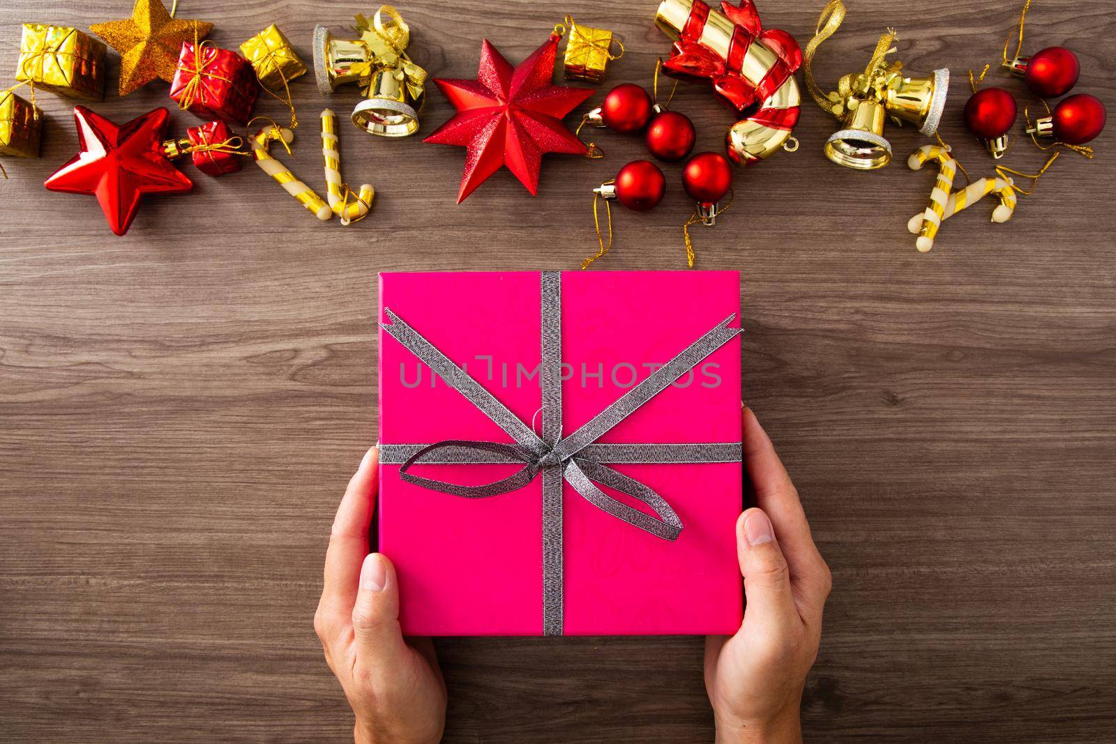 Christmas composition. Christmas gifts, decorations on wooden background. Flat lay, top view. Copy space