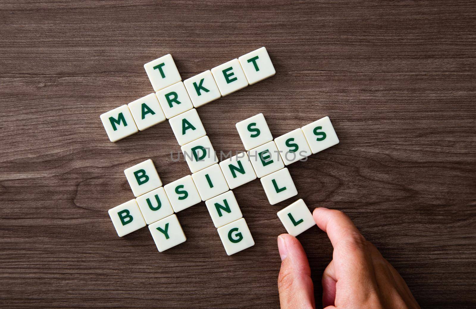 Words of business marketing collected in crossword with plastic cubes