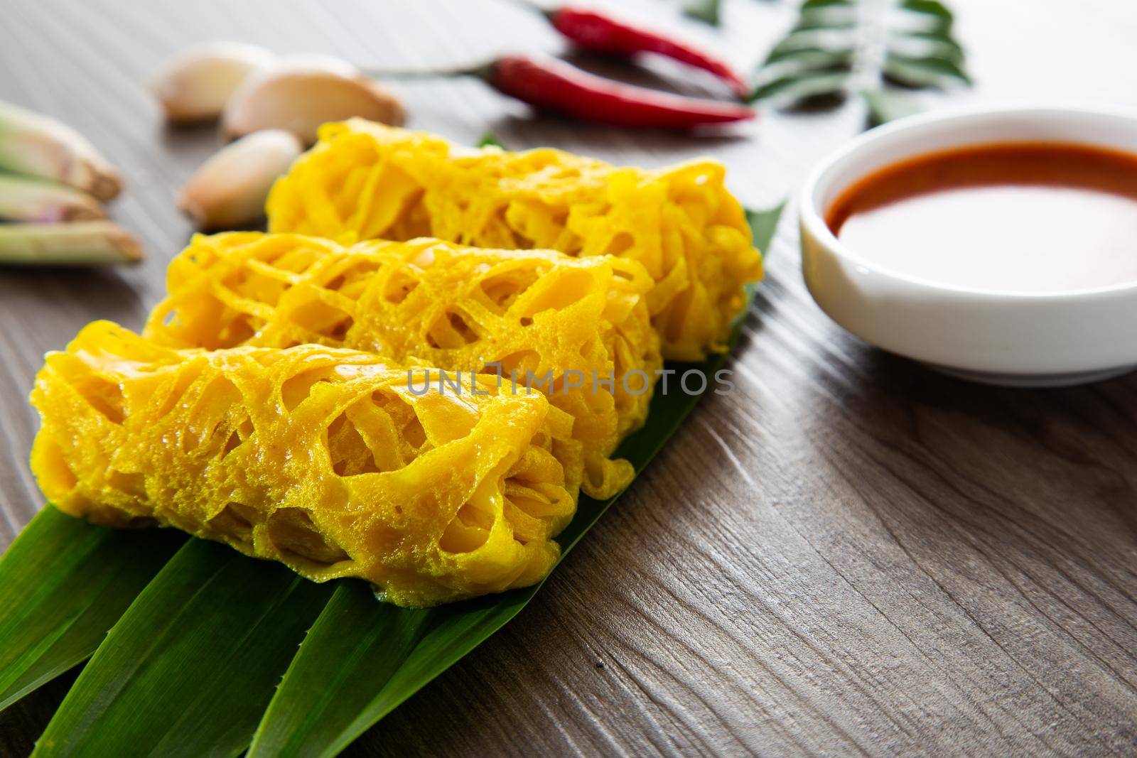 Roti Jala- Traditional Malaysian cake. by tehcheesiong