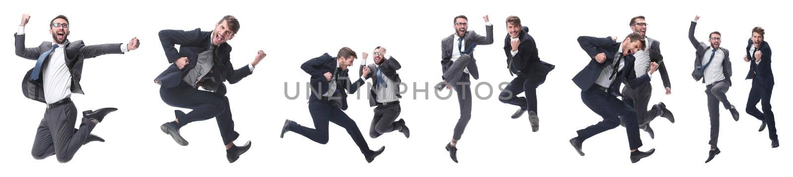 in full growth. two cheerful dancing business people. isolated on white background.