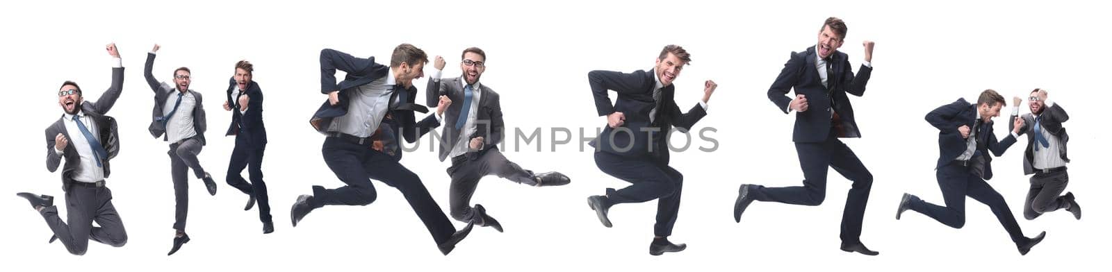 in full growth. two cheerful dancing business people. isolated on white background.