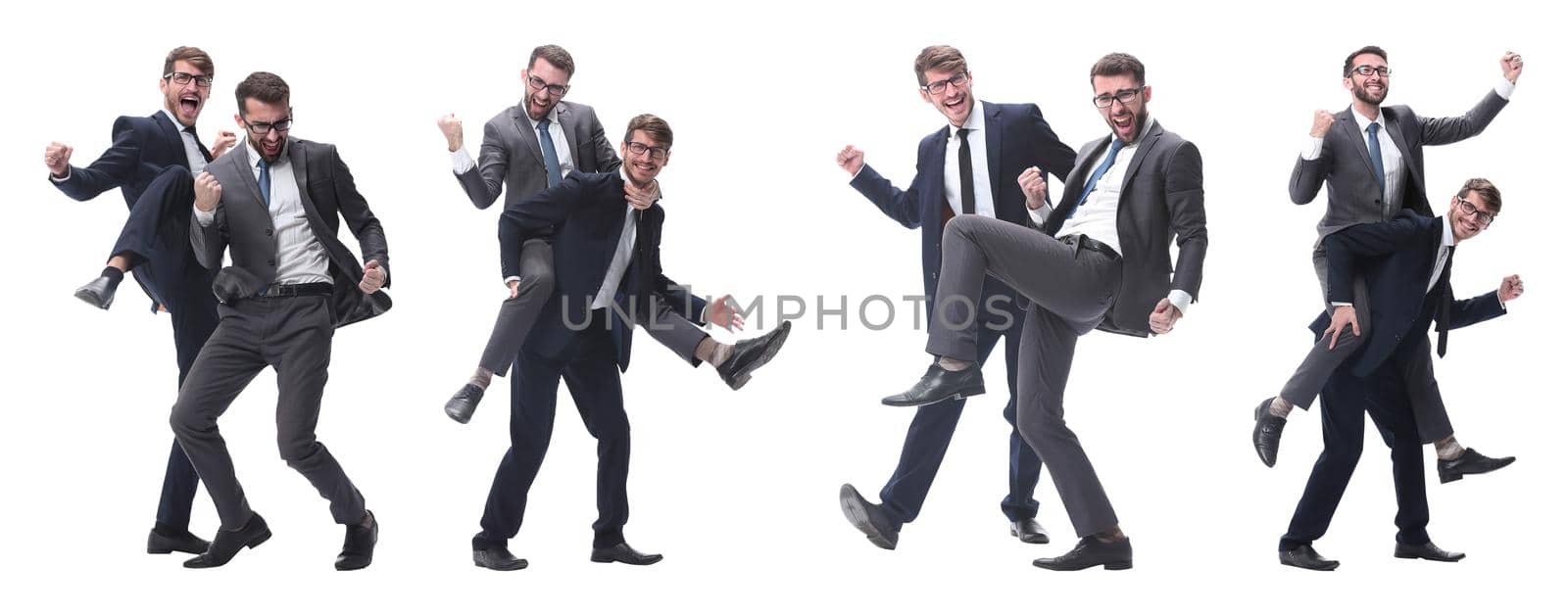 smiling businessman sitting on the back of his colleague . isolated on white background.