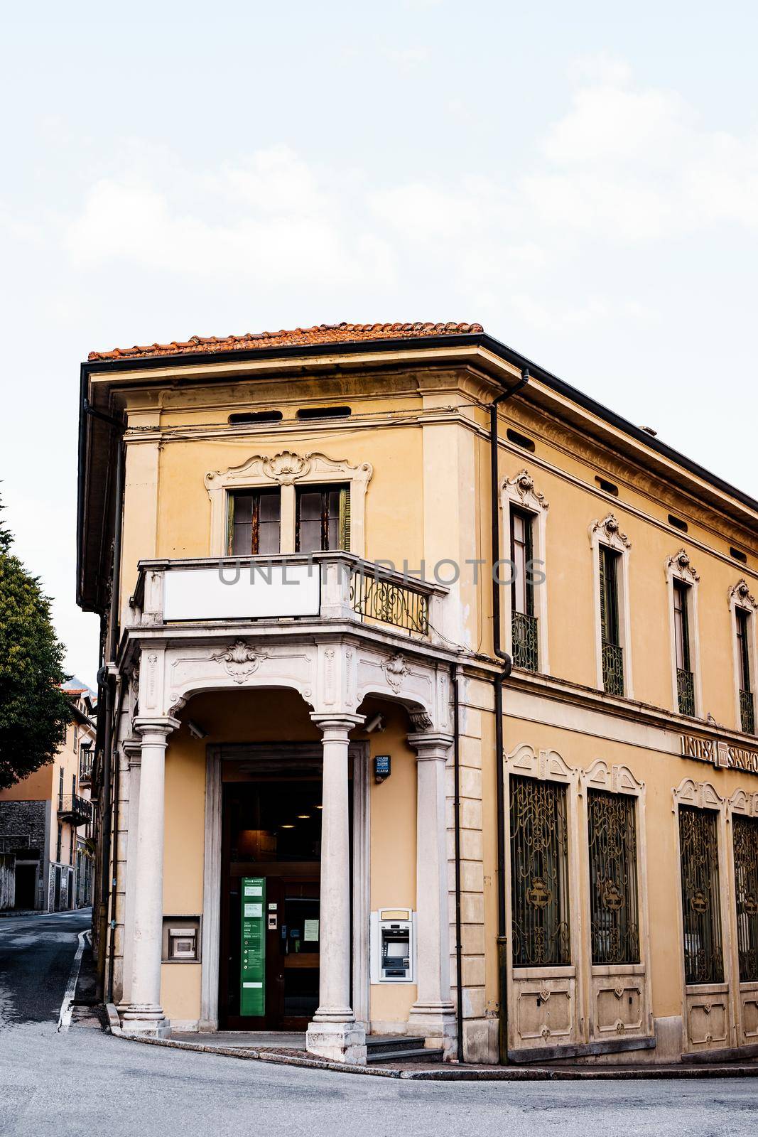 Two-storey house with columns and a balcony in the town of Menaggio. Como, Italy. High quality photo
