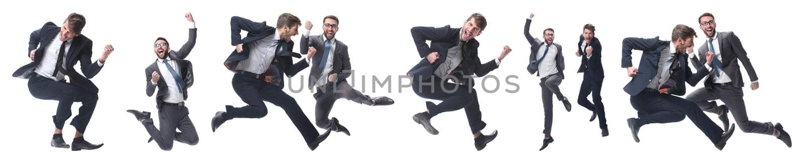 in full growth. two cheerful dancing business people. isolated on white background.