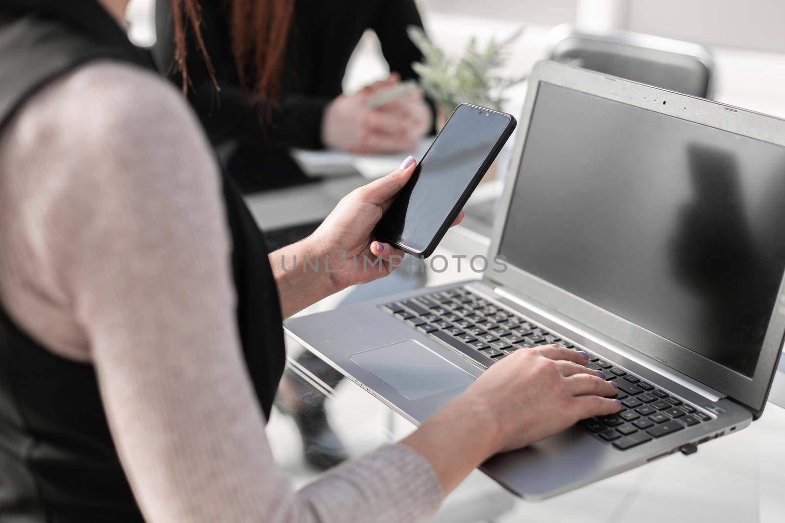 Woman working on computer in office. Businesswoman or student girl using laptop at home