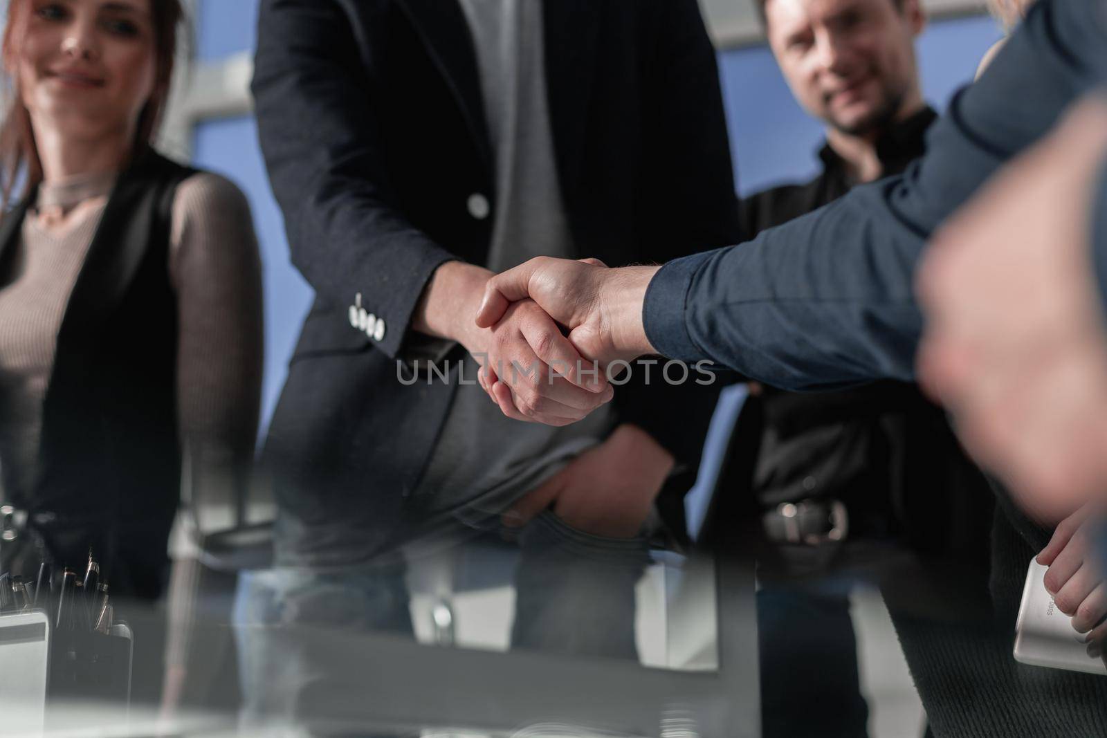 Architect and engineer construction workers shaking hands by asdf
