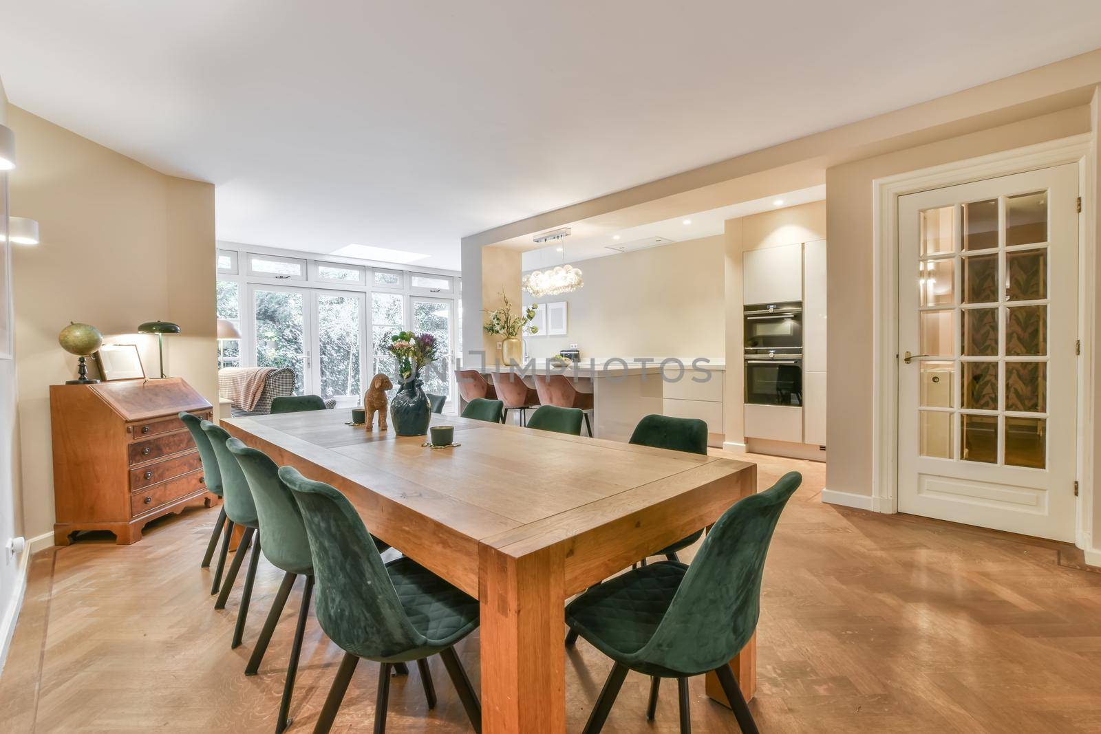 Decorative chairs and wooden table in dining room