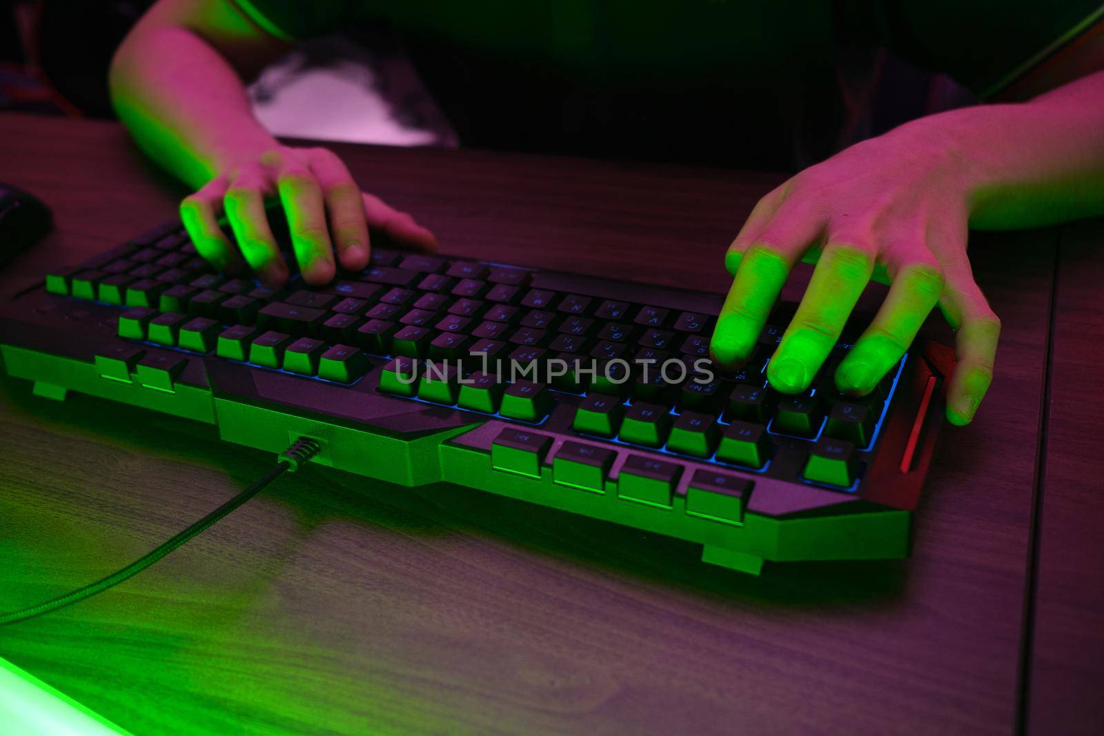 Cyber sport. Team play. Professional cybersport player training or playing online game on his PC by nazarovsergey