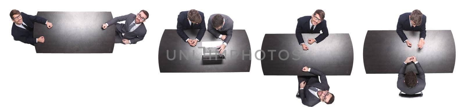 top view. two business people sitting at the Desk. isolated on white background