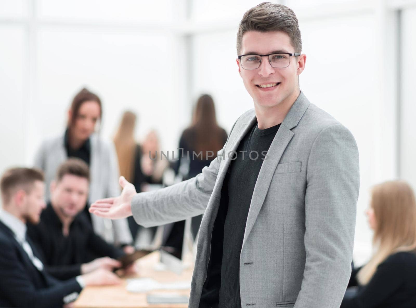 close up. group of employees discussing business documents. office workdays